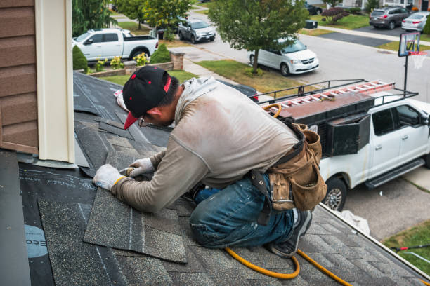 Professional Roof Replacement technician working in Monrovia, IN